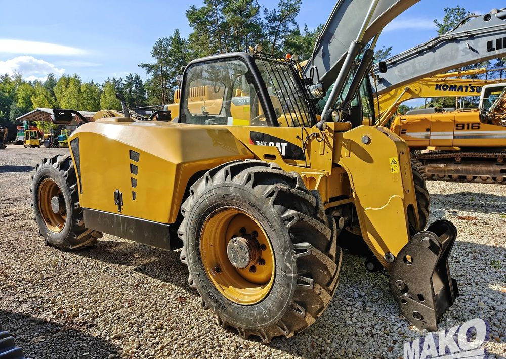 Teleskopski upravljač Caterpillar TH407: slika 6
