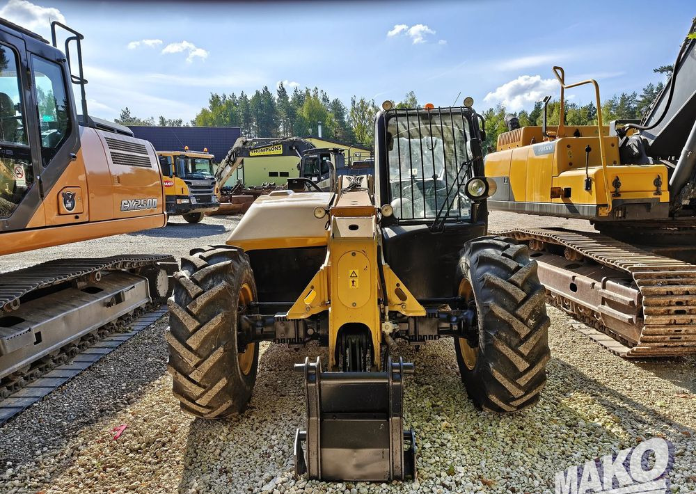 Teleskopski upravljač Caterpillar TH407: slika 7