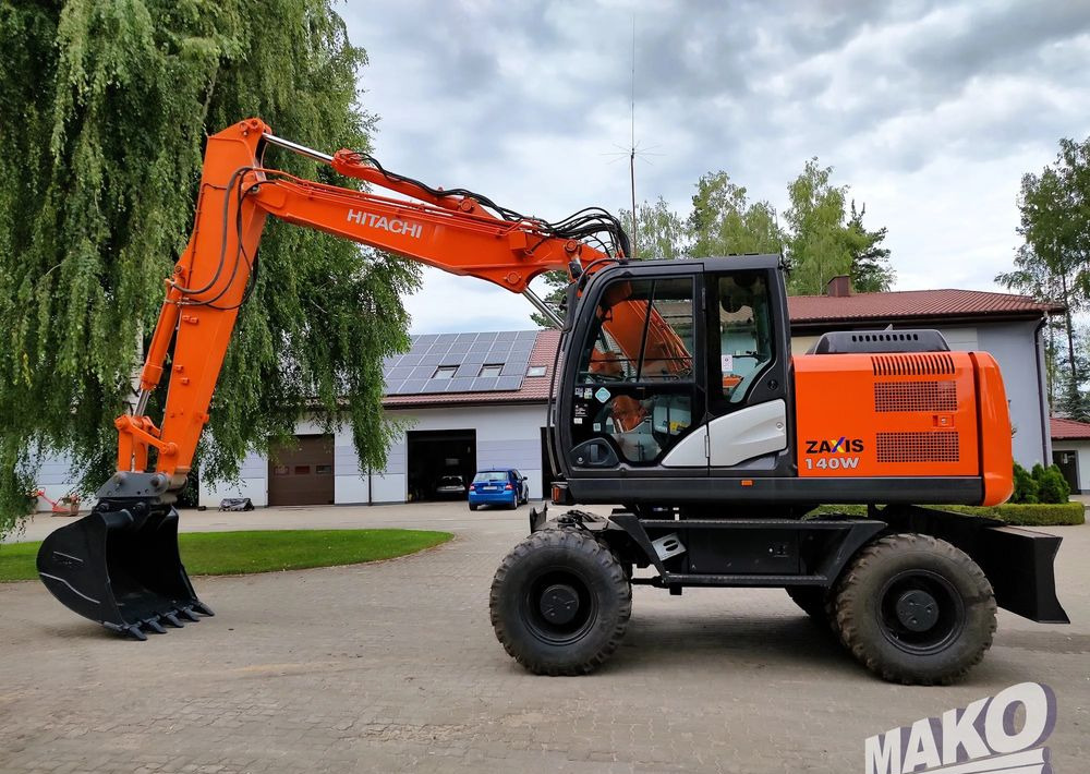 Hitachi ZX 140 - Bager točkaš: slika 1 Hitachi ZX 140 - Bager točkaš: slika 1