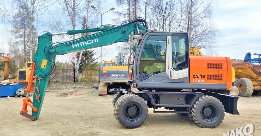 Hitachi ZX140W-3 - Bager točkaš: slika 1 Hitachi ZX140W-3 - Bager točkaš: slika 1