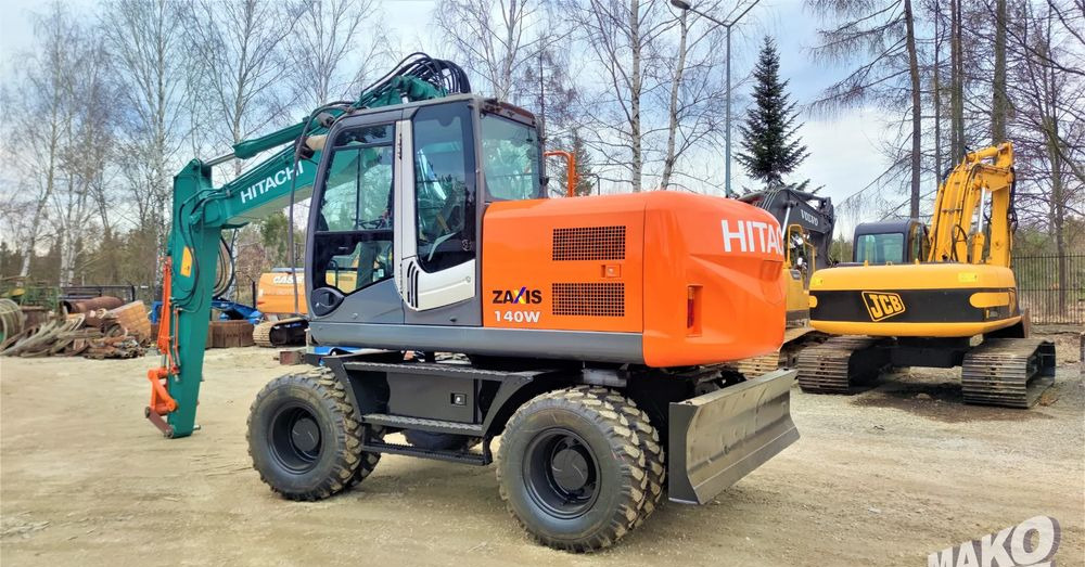 Hitachi ZX140W-3 - Bager točkaš: slika 2 Hitachi ZX140W-3 - Bager točkaš: slika 2