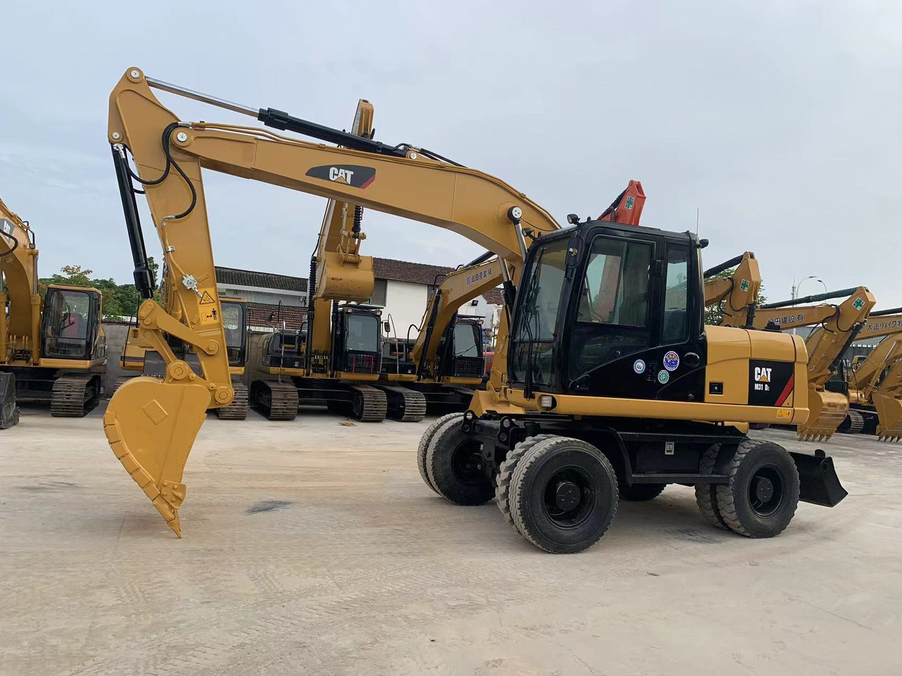 Caterpillar M315D Wheel Excavator Moving by Tires - Bager točkaš: slika 2 Caterpillar M315D Wheel Excavator Moving by Tires - Bager točkaš: slika 2