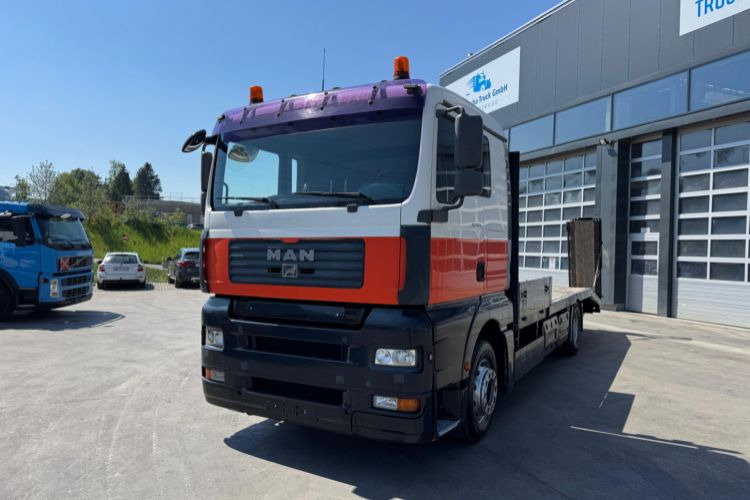 MAN TGA 18.413 4x2 BaggerTaxi - Kamion za prevoz automobila: slika 1 MAN TGA 18.413 4x2 BaggerTaxi - Kamion za prevoz automobila: slika 1