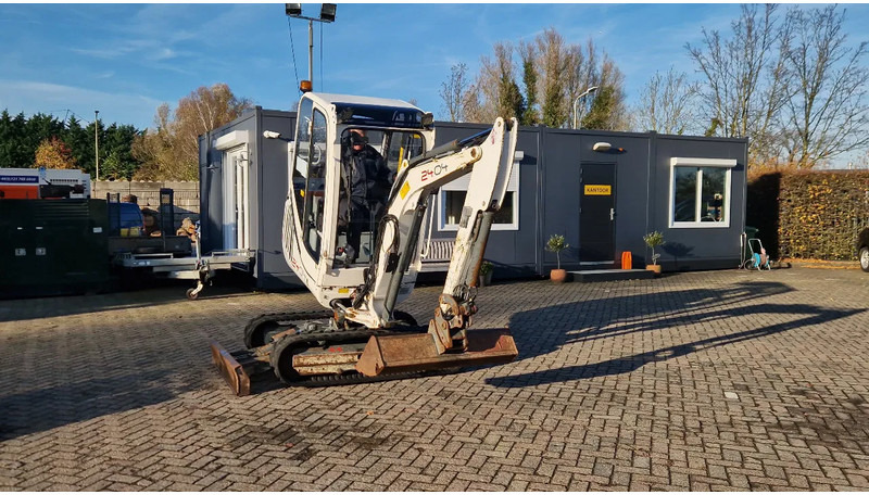 WACKER NEUSON 2404RD kan op een (berg)helling draaien - Mini bager: slika 1 WACKER NEUSON 2404RD kan op een (berg)helling draaien - Mini bager: slika 1
