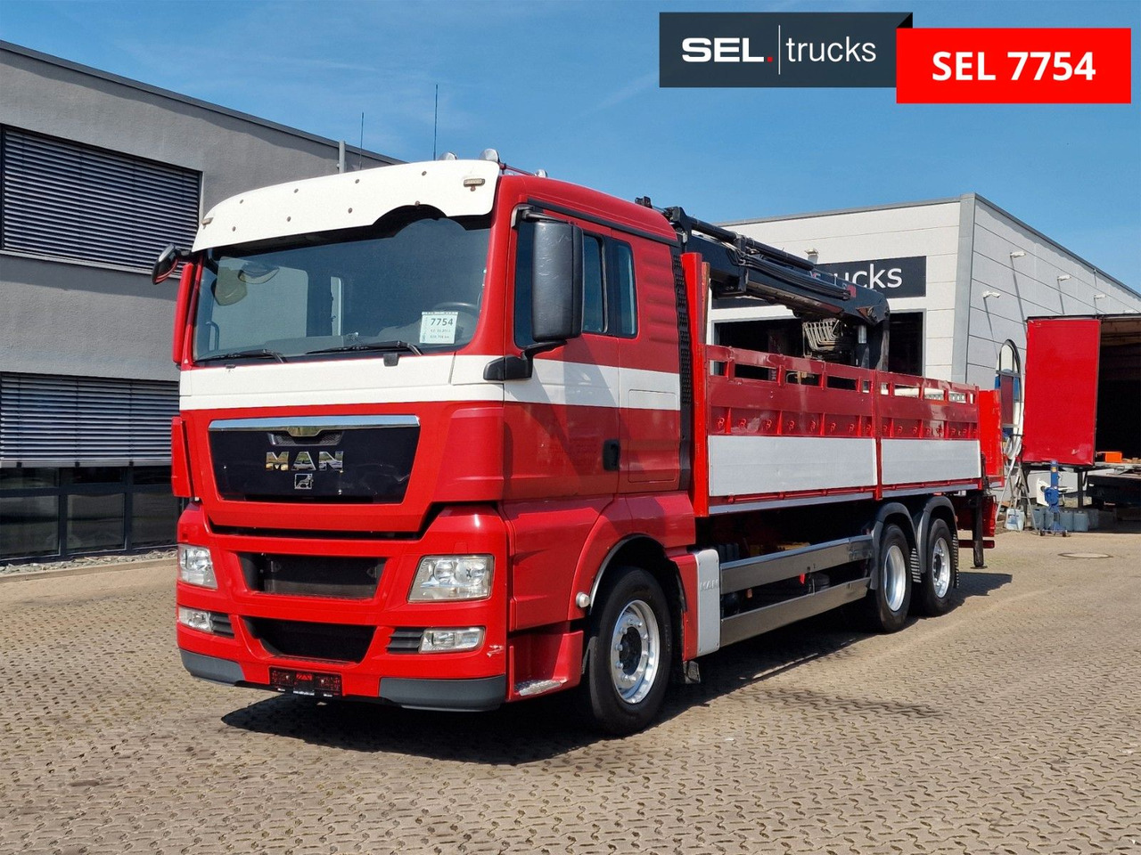 MAN TGX 26.400 6x2-2 BL/ Intarder / HIAB / Lenkachse - Kamion sa dizalicom: slika 1 MAN TGX 26.400 6x2-2 BL/ Intarder / HIAB / Lenkachse - Kamion sa dizalicom: slika 1