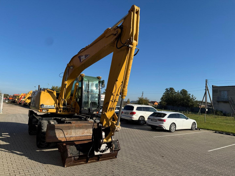 Caterpillar M 316 C - Bager točkaš: slika 2 Caterpillar M 316 C - Bager točkaš: slika 2