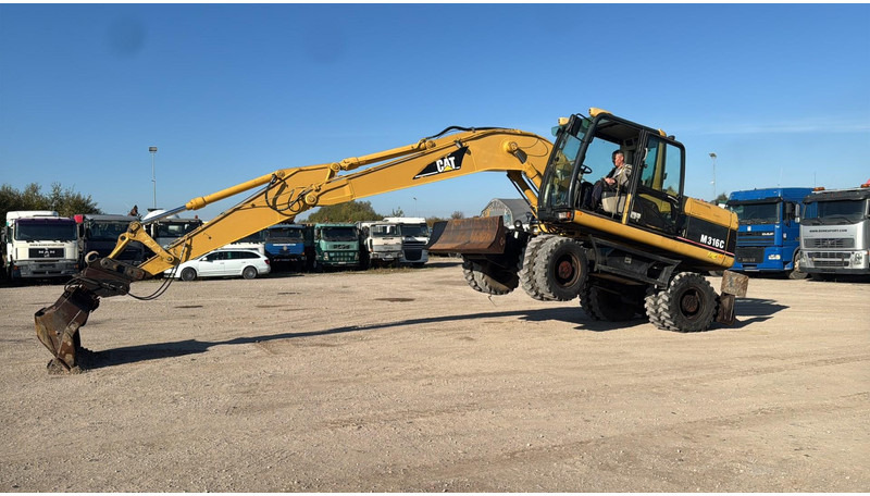 Caterpillar M 316 C - Bager točkaš: slika 5 Caterpillar M 316 C - Bager točkaš: slika 5