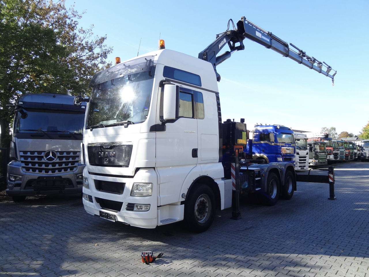 MAN TGX 33.480 6X4 Kran MKG 381 bis 20 Meter - Kamion sa dizalicom, Tegljač: slika 1 MAN TGX 33.480 6X4 Kran MKG 381 bis 20 Meter - Kamion sa dizalicom, Tegljač: slika 1
