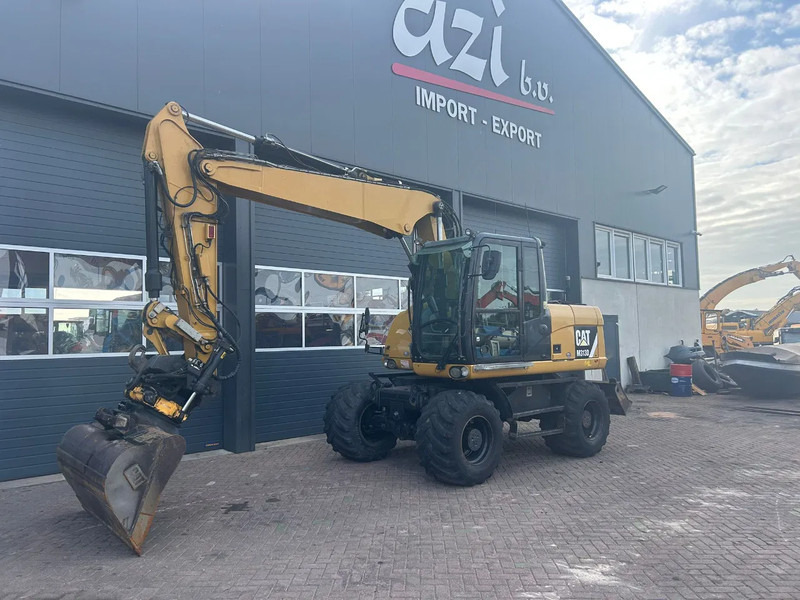 Caterpillar M313D - Bager točkaš: slika 1 Caterpillar M313D - Bager točkaš: slika 1