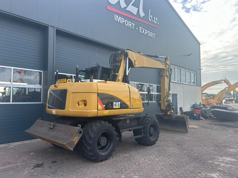 Caterpillar M313D - Bager točkaš: slika 4 Caterpillar M313D - Bager točkaš: slika 4