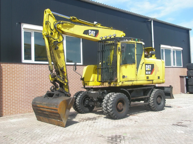Caterpillar M318F - Bager točkaš: slika 1 Caterpillar M318F - Bager točkaš: slika 1