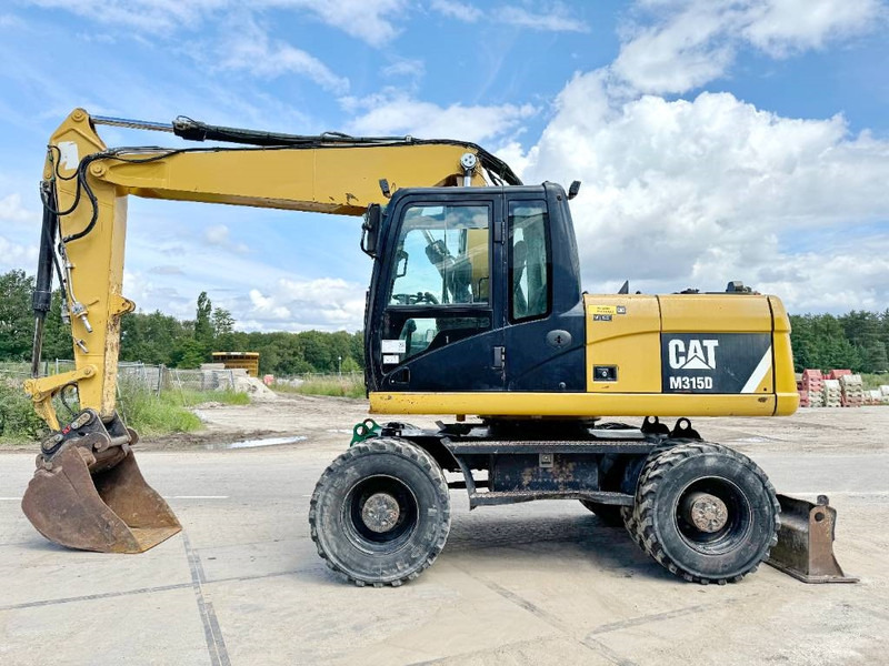 Cat M315D - Triple Boom / Quick Coupler - Bager točkaš: slika 1 Cat M315D - Triple Boom / Quick Coupler - Bager točkaš: slika 1