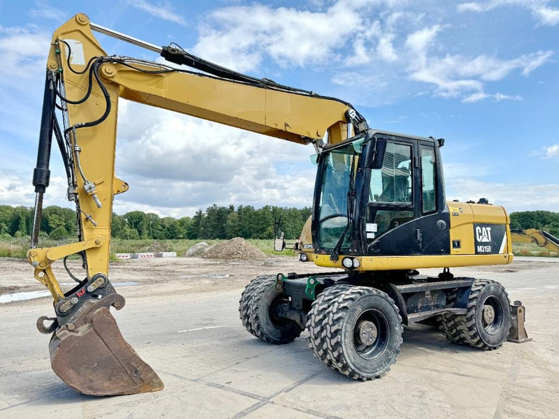 Cat M315D - Triple Boom / Quick Coupler - Bager točkaš: slika 2 Cat M315D - Triple Boom / Quick Coupler - Bager točkaš: slika 2