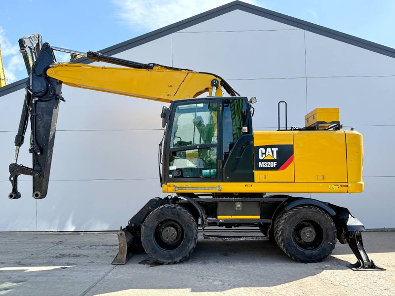 Cat M320F - Dutch Machine / Triple Boom / Auto Lube - Bager točkaš: slika 1 Cat M320F - Dutch Machine / Triple Boom / Auto Lube - Bager točkaš: slika 1