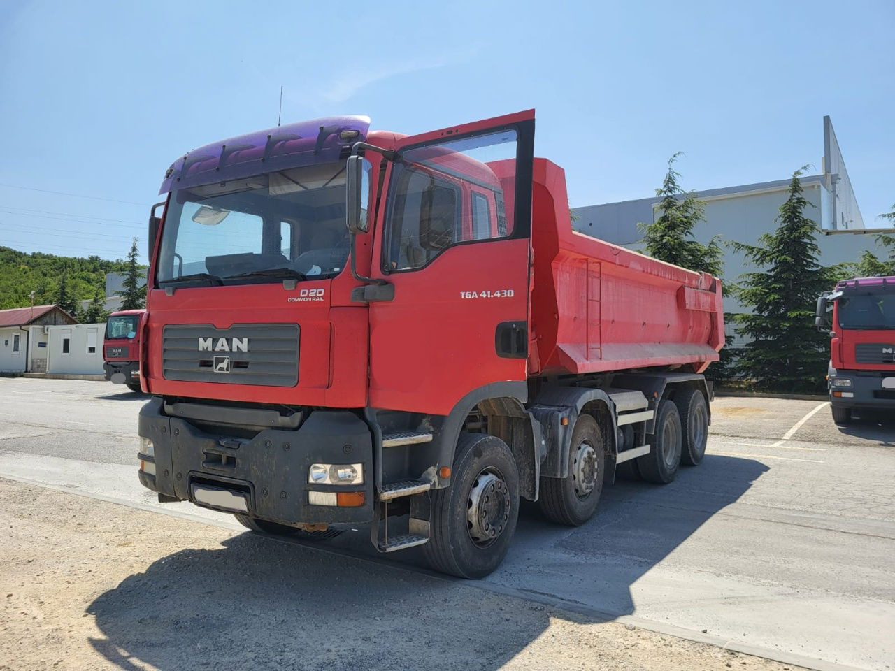 MAN TGA 41.430 8x4 meiller tipper - hydr. back site - Istovarivač: slika 1 MAN TGA 41.430 8x4 meiller tipper - hydr. back site - Istovarivač: slika 1