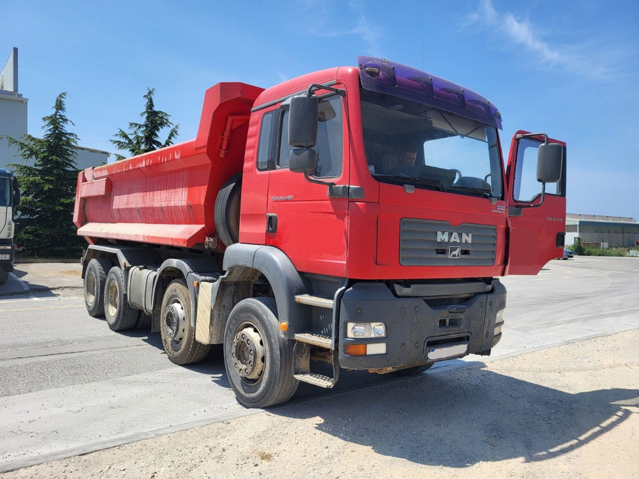 MAN TGA 41.430 8x4 meiller tipper - hydr. back site - Istovarivač: slika 2 MAN TGA 41.430 8x4 meiller tipper - hydr. back site - Istovarivač: slika 2