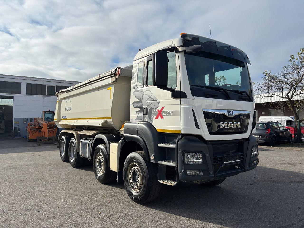 MAN TGS41.510 8x4 Schmitz Muldenkipper Retarder/19m³ - Istovarivač: slika 2 MAN TGS41.510 8x4 Schmitz Muldenkipper Retarder/19m³ - Istovarivač: slika 2