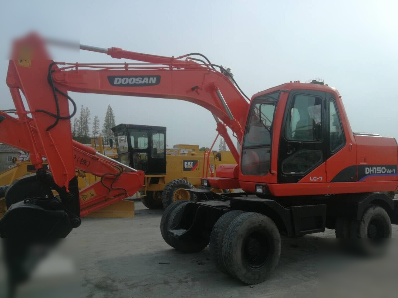 DOOSAN DH150W-7 - Bager točkaš: slika 1 DOOSAN DH150W-7 - Bager točkaš: slika 1