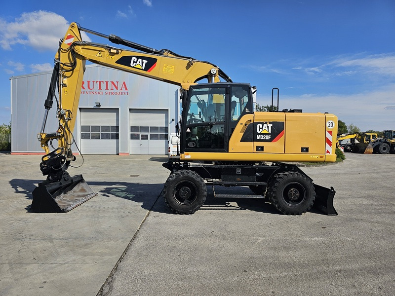CATERPILLAR M320F - Bager točkaš: slika 1 CATERPILLAR M320F - Bager točkaš: slika 1