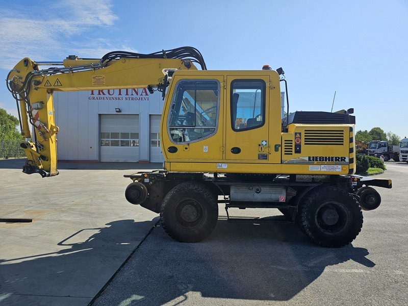 LIEBHERR A900C ZW - Bager točkaš: slika 1 LIEBHERR A900C ZW - Bager točkaš: slika 1