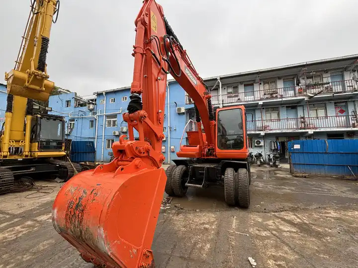 15ton Used Wheel Excavator Doosan Dh150w-7 Made In Korea For Sale With Original Good Running Condition In Shanghai - Bager točkaš: slika 3 15ton Used Wheel Excavator Doosan Dh150w-7 Made In Korea For Sale With Original Good Running Condition In Shanghai - Bager točkaš: slika 3