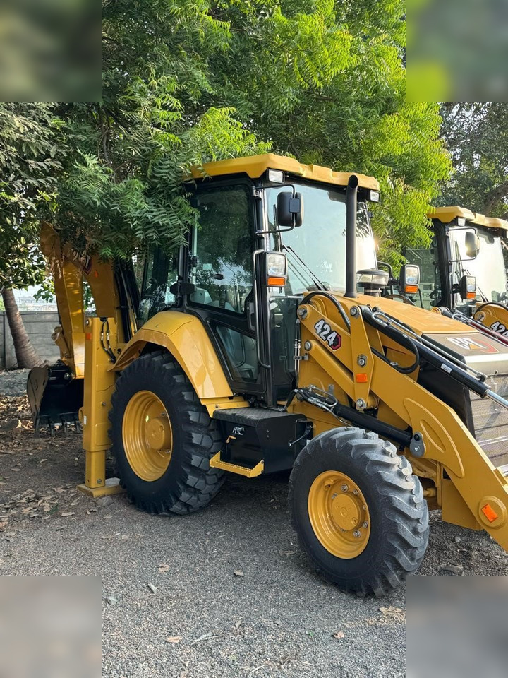 CATERPILLAR 424 - Bager utovarivač: slika 1 CATERPILLAR 424 - Bager utovarivač: slika 1