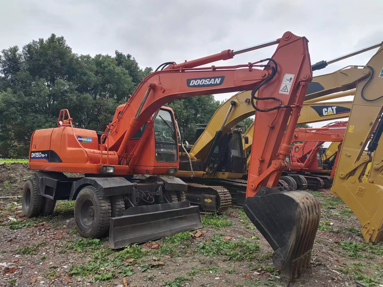 DOOSAN DH150W-7 - Bager točkaš: slika 1 DOOSAN DH150W-7 - Bager točkaš: slika 1