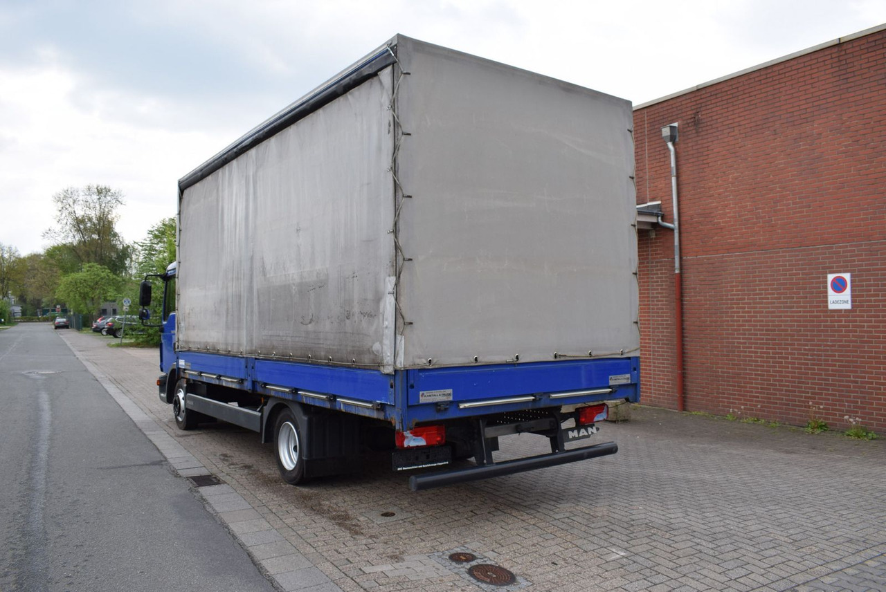 MAN TGL 8.180 Pritsche Schiebeplane Klima 3-Sitzer - Dostavno vozilo sa ceradom: slika 5 MAN TGL 8.180 Pritsche Schiebeplane Klima 3-Sitzer - Dostavno vozilo sa ceradom: slika 5