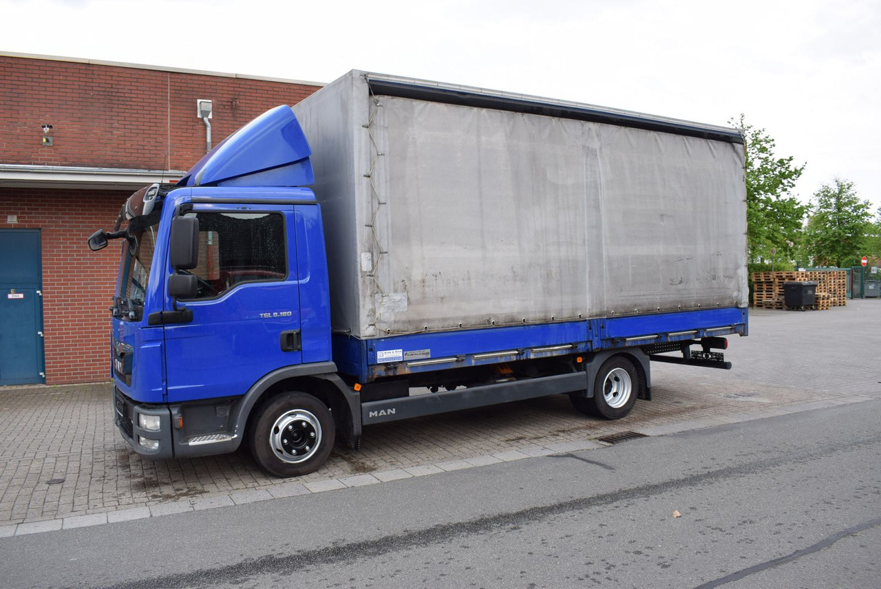 MAN TGL 8.180 Pritsche Schiebeplane Klima 3-Sitzer - Dostavno vozilo sa ceradom: slika 2 MAN TGL 8.180 Pritsche Schiebeplane Klima 3-Sitzer - Dostavno vozilo sa ceradom: slika 2