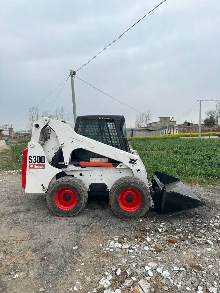 Bobcat S 300 - Mini utovarivač: slika 1 Bobcat S 300 - Mini utovarivač: slika 1