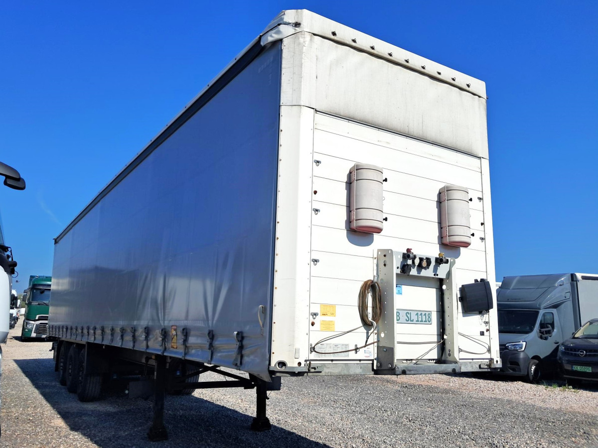 SCHMITZ SCS 24/L - 13.62 EB KURTYNOWA Z PODWIESZANYM WÓZKIEM WIDŁOWYM - Prikolica sa ceradom: slika 1 SCHMITZ SCS 24/L - 13.62 EB KURTYNOWA Z PODWIESZANYM WÓZKIEM WIDŁOWYM - Prikolica sa ceradom: slika 1