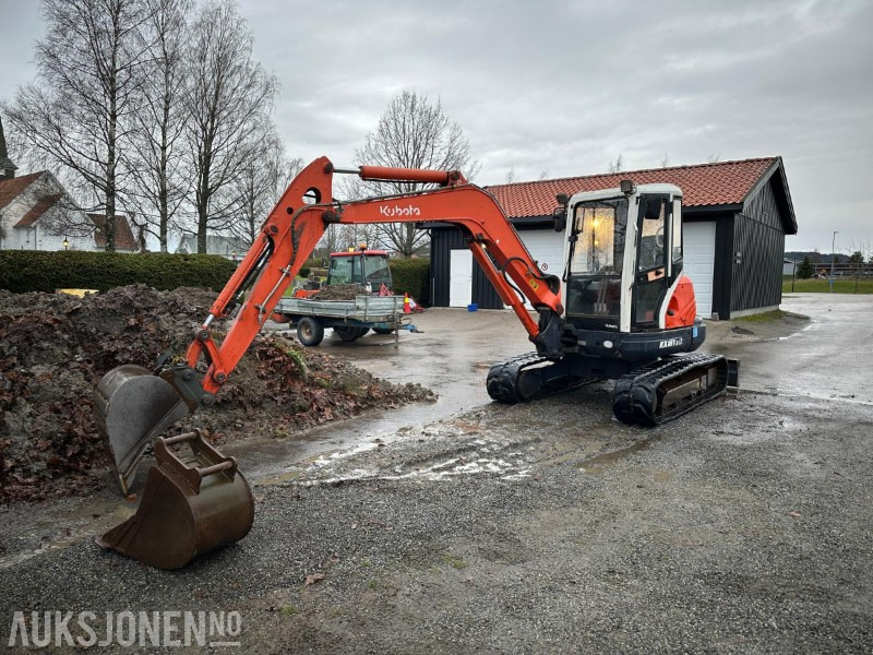 Kubota KX161-3α – 2006 – 3708 timer – 2 skuffer + klype – ca. 5,5 tonn – CE-merket - Mini bager: slika 1 Kubota KX161-3α – 2006 – 3708 timer – 2 skuffer + klype – ca. 5,5 tonn – CE-merket - Mini bager: slika 1