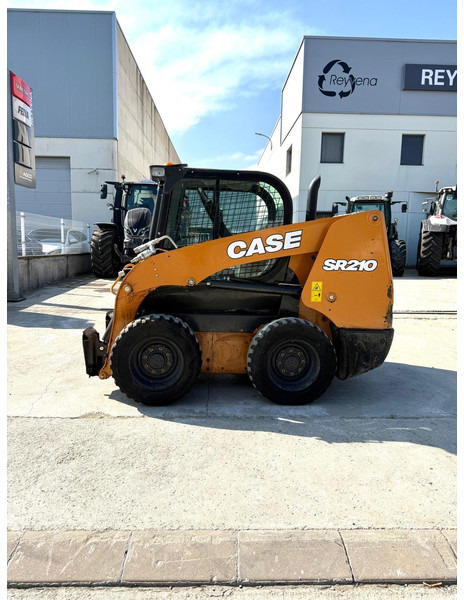 Case SR210 - Utovarivač točkaš: slika 1 Case SR210 - Utovarivač točkaš: slika 1