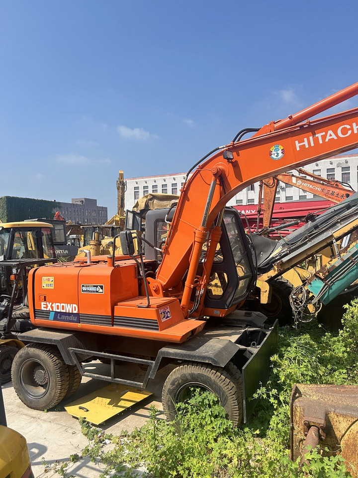 HITACHI Hitachi EX100WD wheel excavator - Bager točkaš: slika 1 HITACHI Hitachi EX100WD wheel excavator - Bager točkaš: slika 1