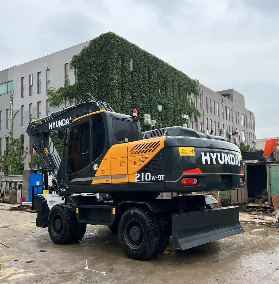 Hyundai 210w-9 wheel excavator - Bager točkaš: slika 1 Hyundai 210w-9 wheel excavator - Bager točkaš: slika 1