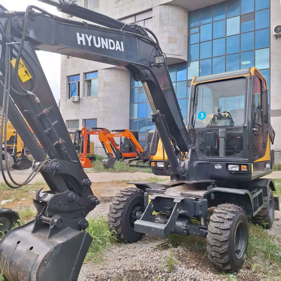 Hyundai HW60 excavator - Bager točkaš: slika 1 Hyundai HW60 excavator - Bager točkaš: slika 1