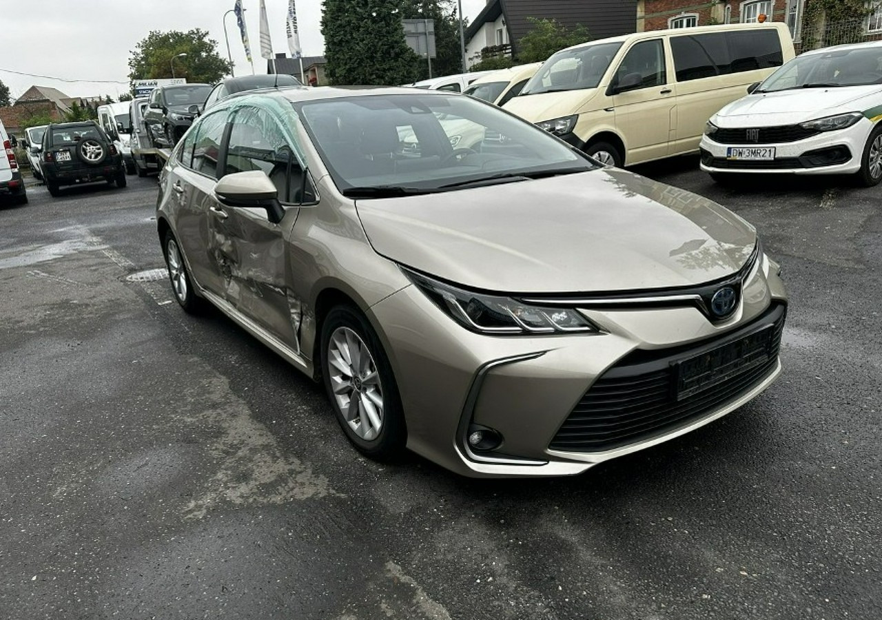 Toyota Corolla XII Corolla Sedan 1.8 Hybrid 98KM Comfort Salon PL 2022 - Limuzina: slika 1 Toyota Corolla XII Corolla Sedan 1.8 Hybrid 98KM Comfort Salon PL 2022 - Limuzina: slika 1