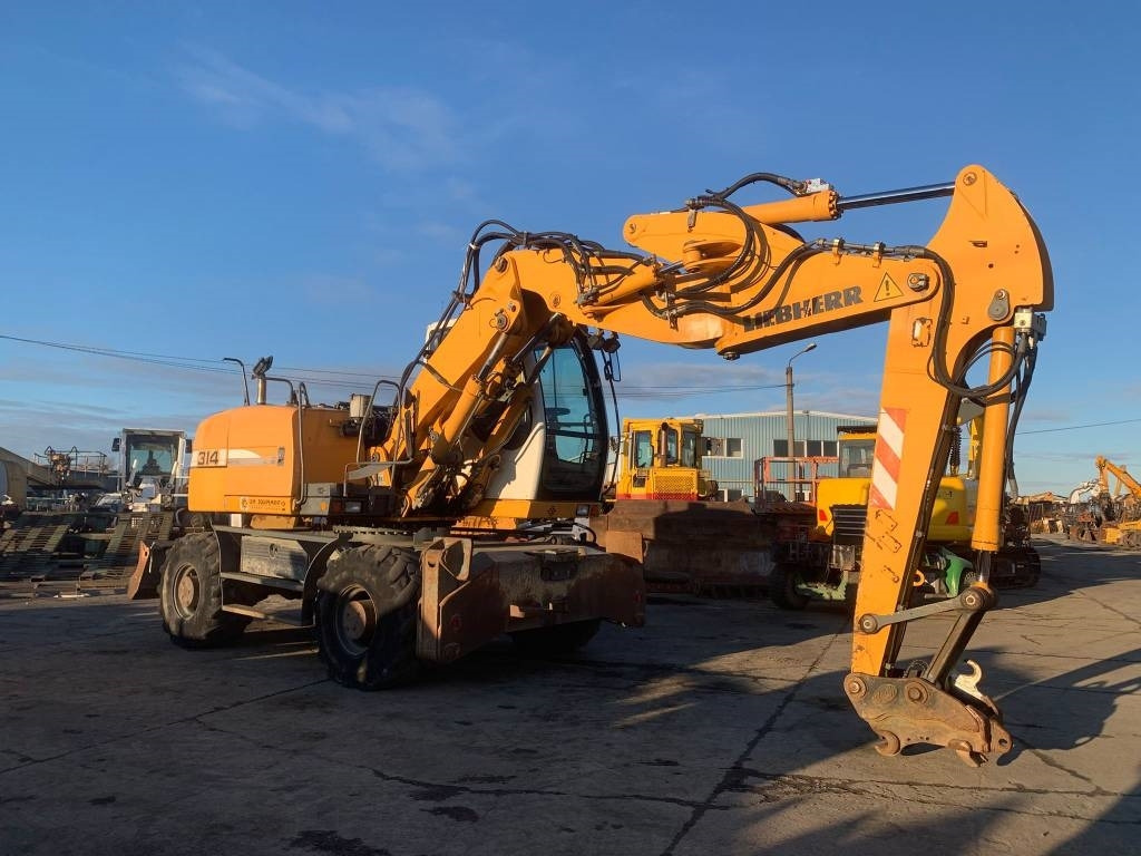 Liebherr A 314 Litronic - Bager točkaš: slika 5 Liebherr A 314 Litronic - Bager točkaš: slika 5