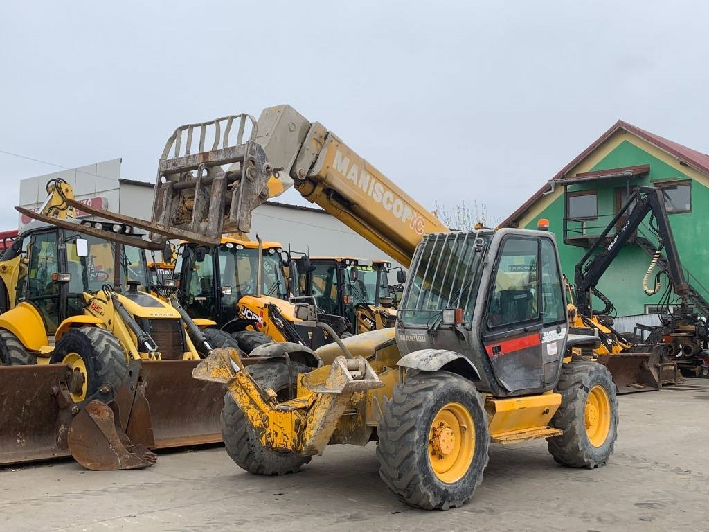 Manitou MT 1233 S - Teleskopski upravljač: slika 1 Manitou MT 1233 S - Teleskopski upravljač: slika 1