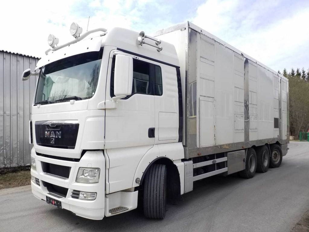 MAN TGX 35.540 8X4 TRIDEM ANIMAL - Kamion za prevoz stoke: slika 1 MAN TGX 35.540 8X4 TRIDEM ANIMAL - Kamion za prevoz stoke: slika 1