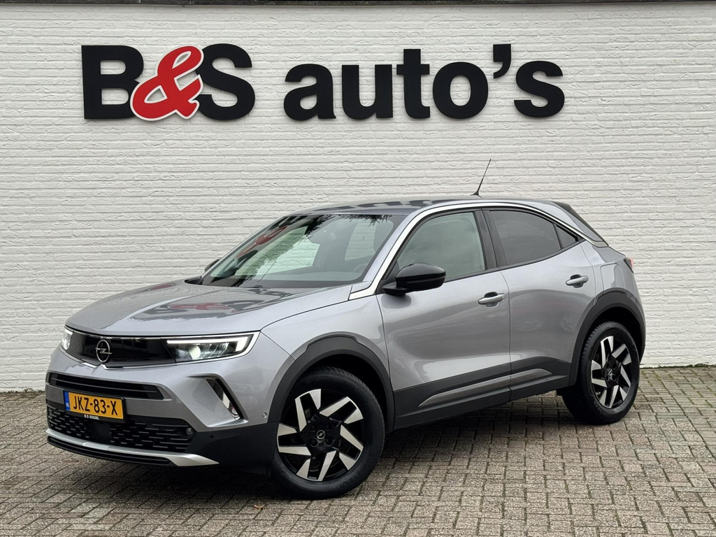 Opel Mokka-1.2 Turbo Elegance Cruise control Climate control Stoel- stuurverwarming Apple / Android Parkeersensoren plus camera - SUV: slika 1 Opel Mokka-1.2 Turbo Elegance Cruise control Climate control Stoel- stuurverwarming Apple / Android Parkeersensoren plus camera - SUV: slika 1