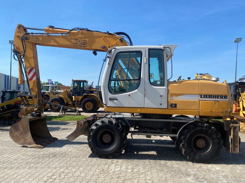 Liebherr A316 Litronic A 316 litronic - Bager točkaš: slika 2 Liebherr A316 Litronic A 316 litronic - Bager točkaš: slika 2