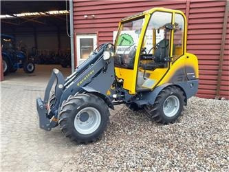 Eurotrac W12 med førerhus - Zglobni utovarivač: slika 1 Eurotrac W12 med førerhus - Zglobni utovarivač: slika 1