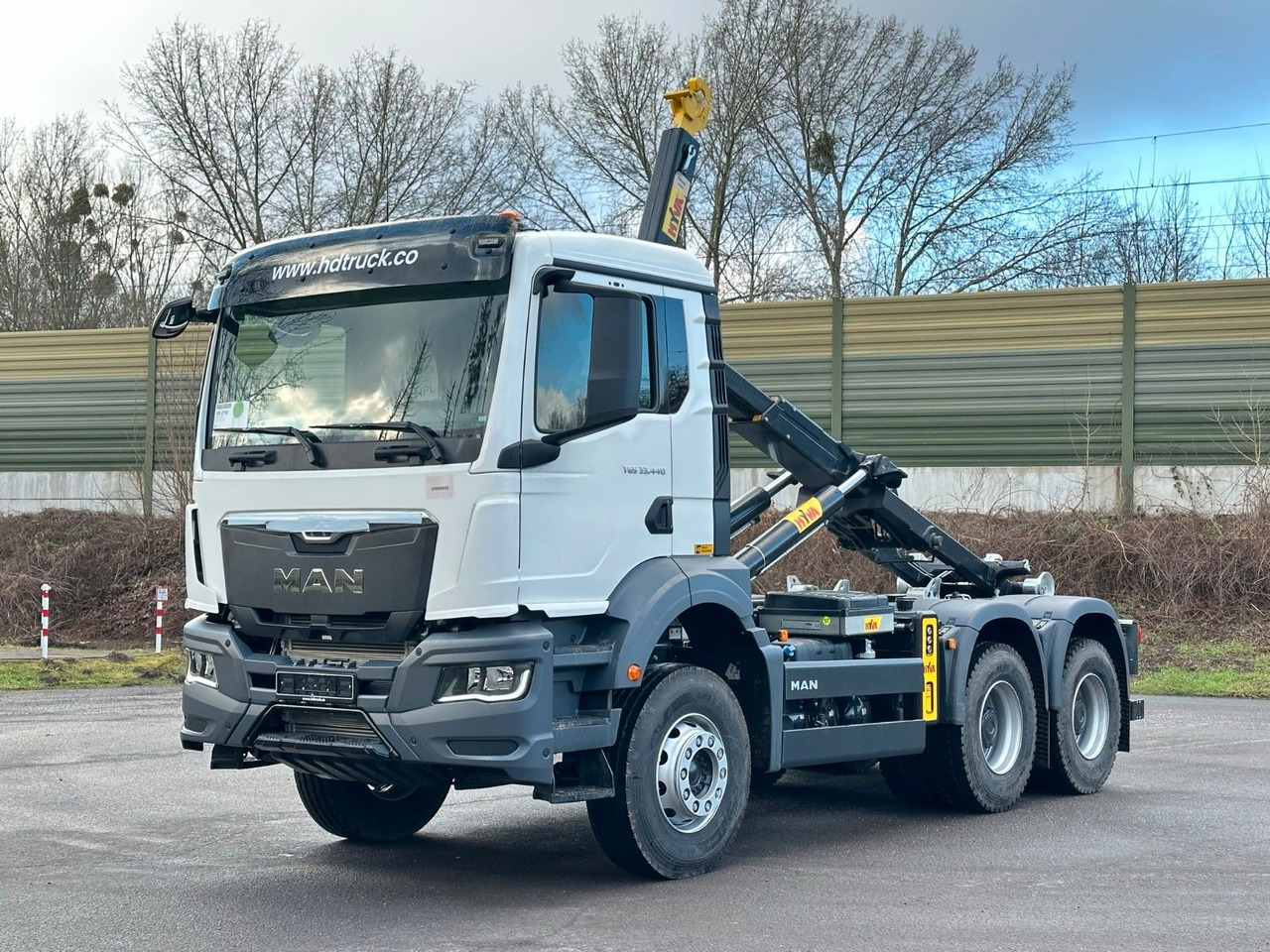 MAN TGS 33.440 6x4 Euro6e Abrollkipper Hyva - Kamion sa hidrauličnom kukom, Kamion sa dizalicom: slika 1 MAN TGS 33.440 6x4 Euro6e Abrollkipper Hyva - Kamion sa hidrauličnom kukom, Kamion sa dizalicom: slika 1