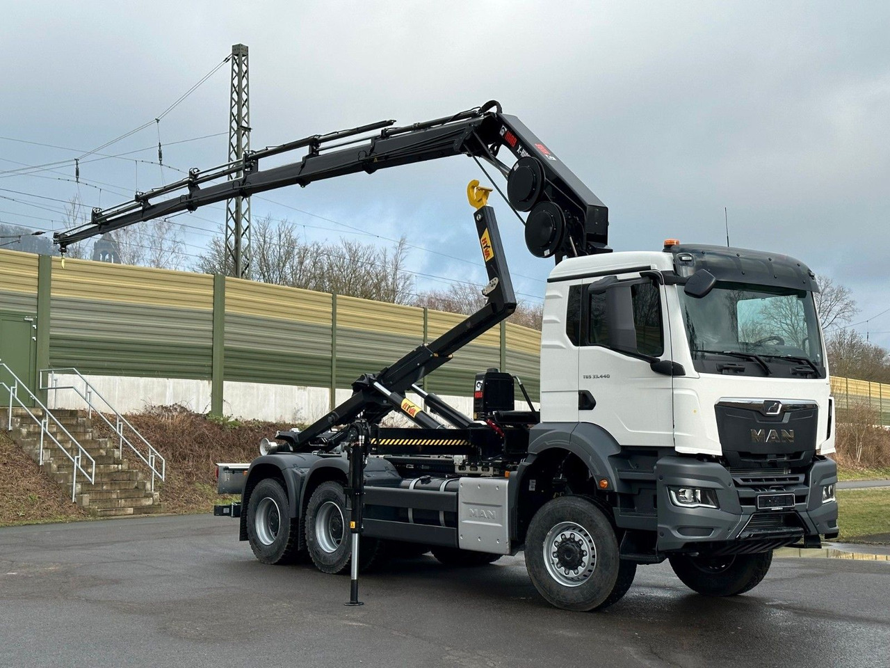 MAN TGS 33.440 6x6 BB Abrollkipper+Kran Hiab 228-6 - Kamion sa hidrauličnom kukom, Kamion sa dizalicom: slika 1 MAN TGS 33.440 6x6 BB Abrollkipper+Kran Hiab 228-6 - Kamion sa hidrauličnom kukom, Kamion sa dizalicom: slika 1