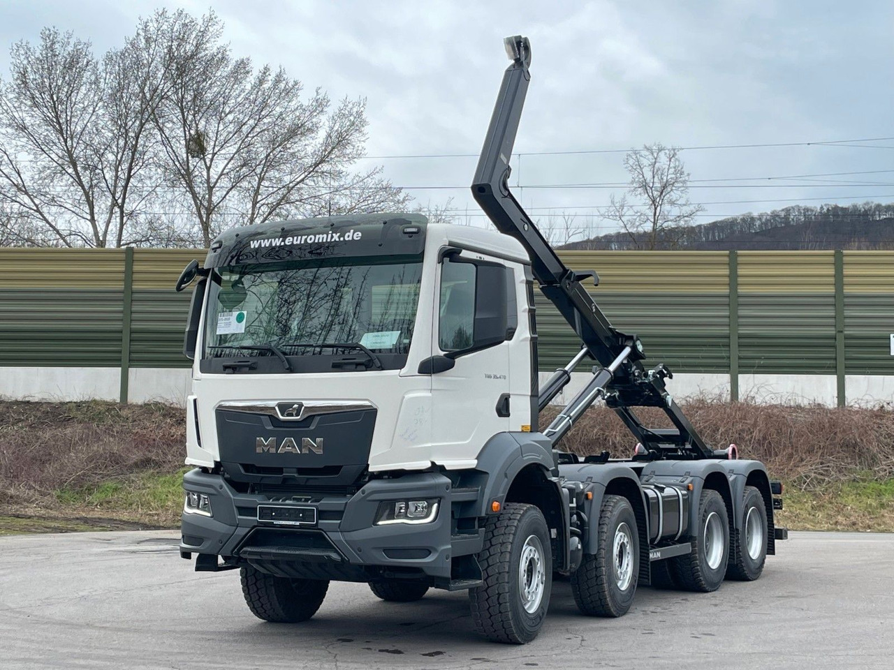 MAN TGS 35.470 8x4 Euro6e Hiab MultLift Abrollkipper - Kamion sa hidrauličnom kukom, Kamion sa dizalicom: slika 1 MAN TGS 35.470 8x4 Euro6e Hiab MultLift Abrollkipper - Kamion sa hidrauličnom kukom, Kamion sa dizalicom: slika 1