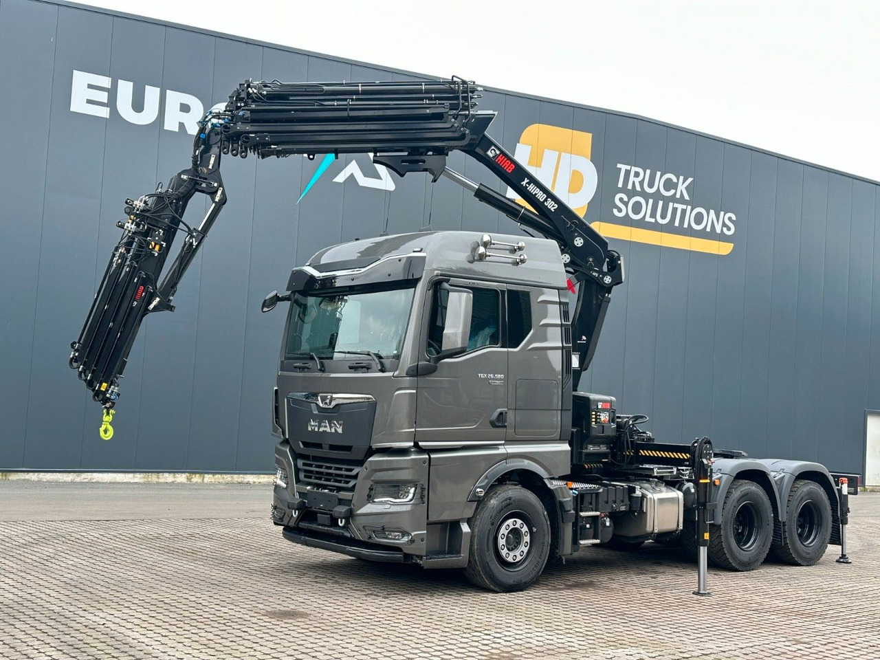 MAN TGX 26.580 6x4 Kran Hiab 302-6 + Jib-4 - Kamion sa dizalicom: slika 1 MAN TGX 26.580 6x4 Kran Hiab 302-6 + Jib-4 - Kamion sa dizalicom: slika 1