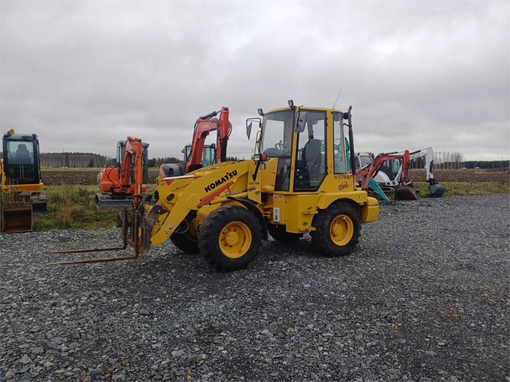 Komatsu WB70A Pyöräkuormaaja - Utovarivač točkaš: slika 1 Komatsu WB70A Pyöräkuormaaja - Utovarivač točkaš: slika 1