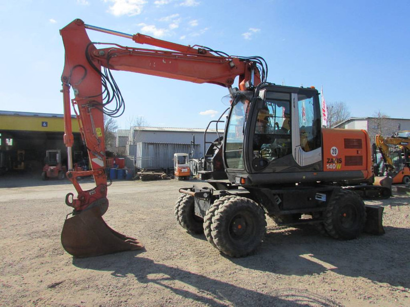 Hitachi ZX 140 W-3 Mobilbagger 43.000 EUR / Klima - Bager točkaš: slika 1 Hitachi ZX 140 W-3 Mobilbagger 43.000 EUR / Klima - Bager točkaš: slika 1