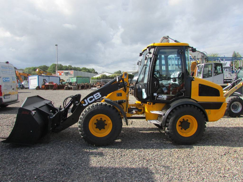 JCB 409 Radlader 46.500 EUR - Utovarivač točkaš: slika 1 JCB 409 Radlader 46.500 EUR - Utovarivač točkaš: slika 1